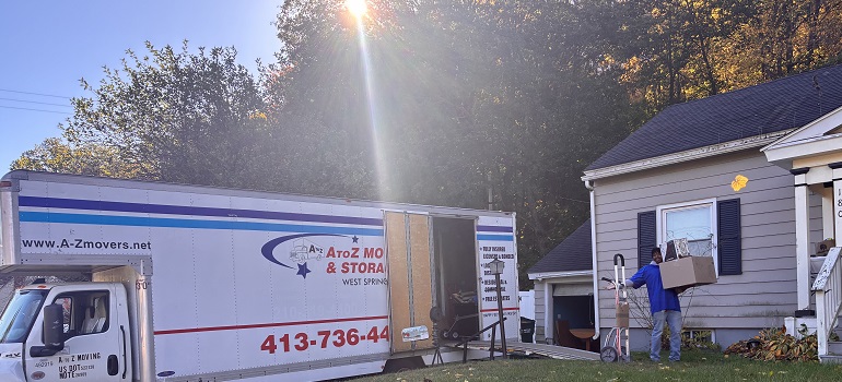 a moving truck in front of a home