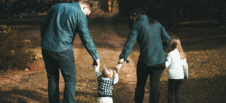 Family considering Longmeadow vs East Longmeadow during stroll