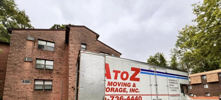 The moving truck on the lawn